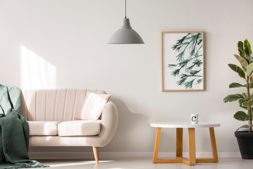 Simple Poster Hanging On The Wall In Bright Living Room